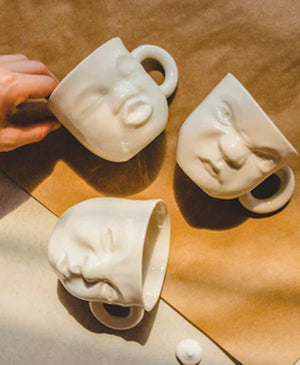 Porcelain Mug, Yawning Face