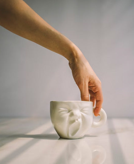 Porcelain Mug, Yawning Face